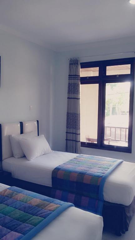 קוטה לומבוק Mustika Inn חדר תמונה
